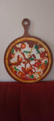 Wooden chopper board with pizza art